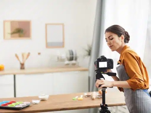 Video Marketing with ChatGPT Woman filming a cooking demonstration for video content creation