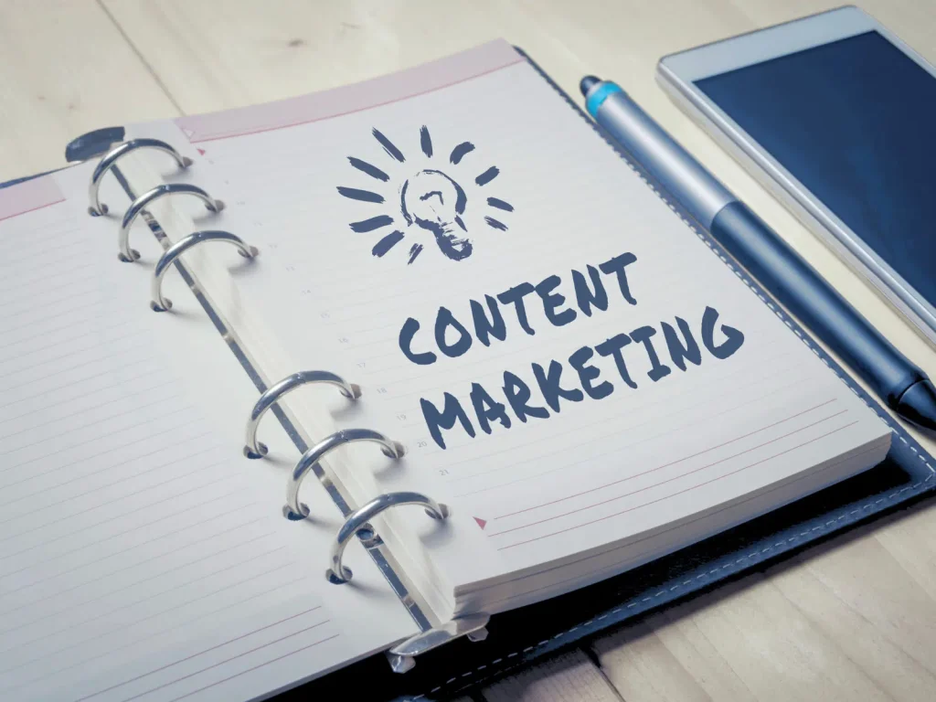 An open content marketing notebook, representing planning ideas for repurposing content into multiple formats